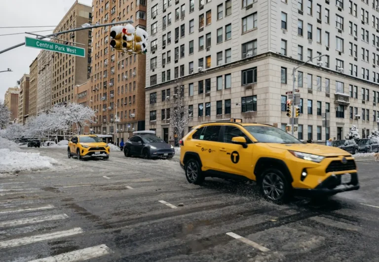 New York street covered in snow after a blizzard, the kind of storm that can trigger a NY travel ban